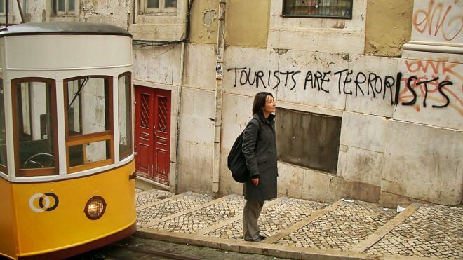 Anti-Tourism Graffiti in Lisbon: Tourists Are Terrorists