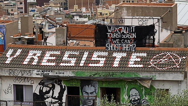 Anti-Tourism Banner in Barcelona: Tourist Season