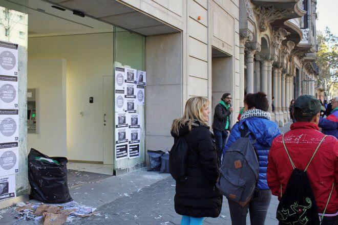 Protest Signs: Flash Mob Takes Over a Bank