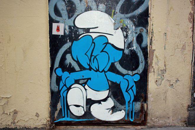 Street Art in Barcelona: Smurf Face by Bustart